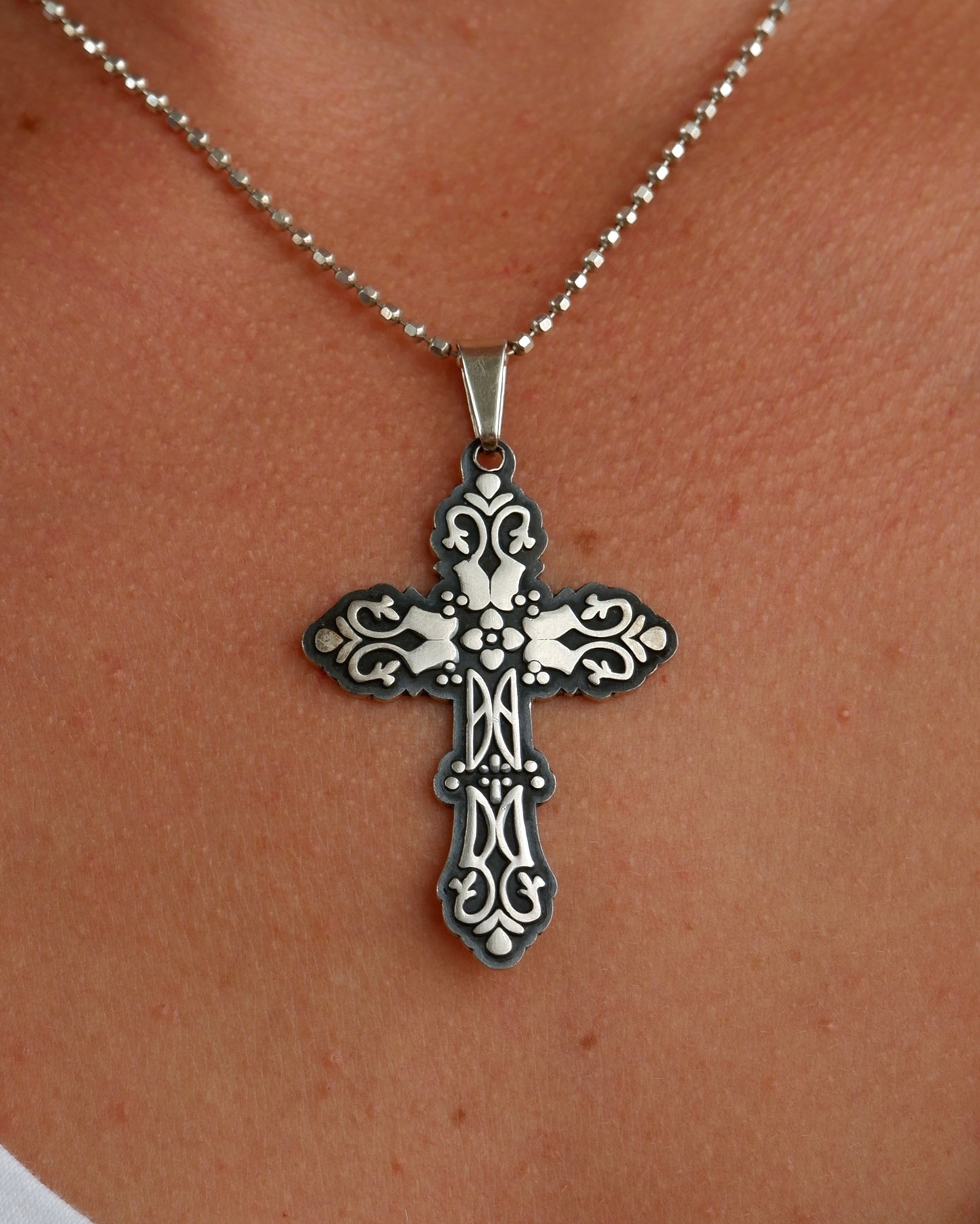Relief Scrollwork Cross Necklace